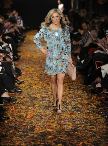 Audrey McClelland of in a floral patterned tunic dress from TJ Maxx that can flow from work to PTA meeting with ease.