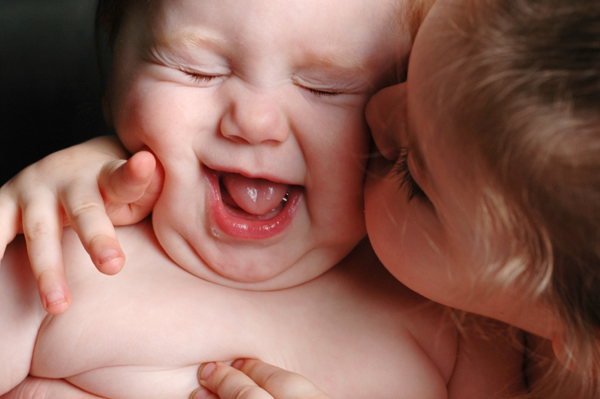 Toddler with baby