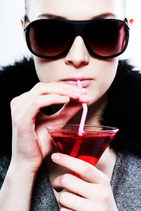 Woman drinking a martini