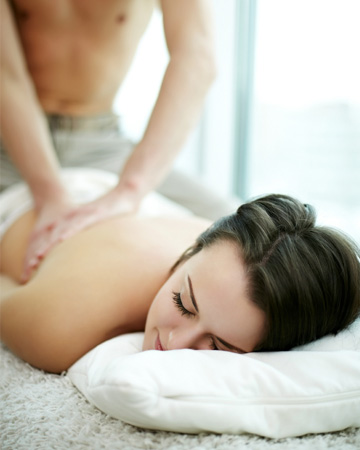 Woman geting massage from man