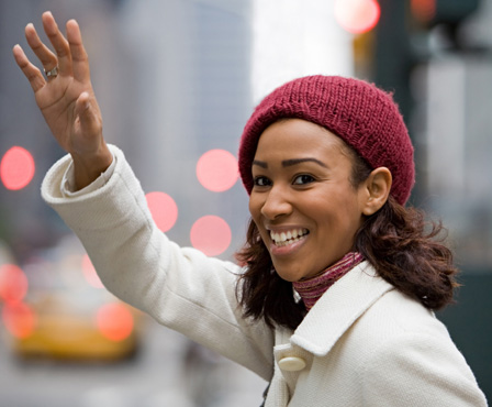 Woman hailing a cab