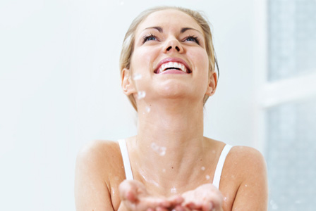 Woman washing face