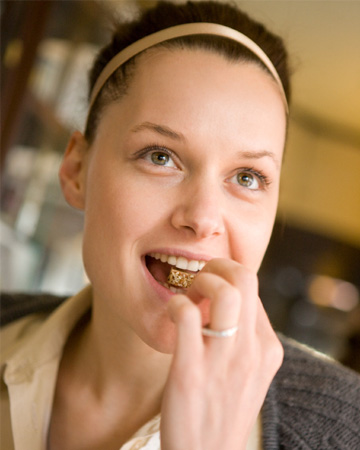 Woman eating whole grains