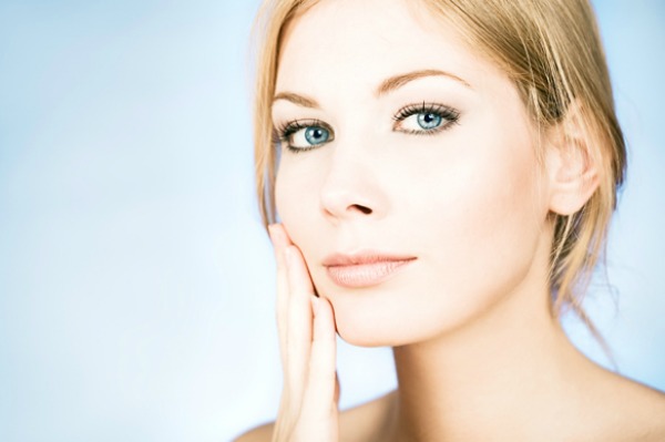 Woman applying foundation