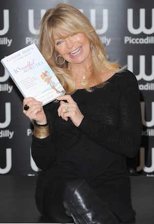 Goldie Hawn leaves London club looking drunk.