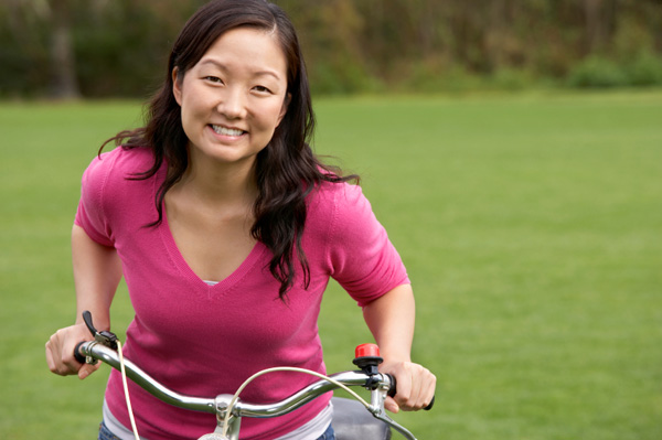 Happy woman on bike