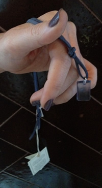 Savage Senses at Fashion Week 2012: Designs made by hand. Clean Water Tag necklace