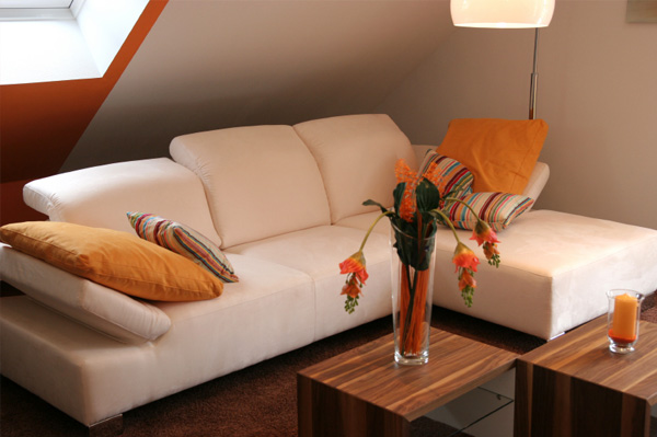 Simple orange accented living room