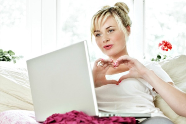 Woman talking to long distance boyfriend on Skype