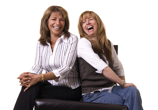 two woman laughing together