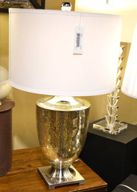 Unique mirrored surfaces like this mercury glass lamp are becoming must-have looks.