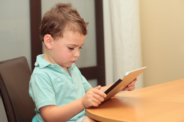 Little boy using a tablet