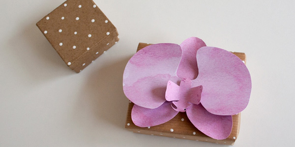 Finished DIY craft: watercolor paper orchid on a box