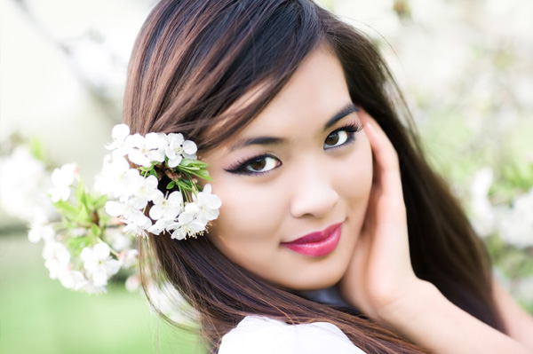 Woman wearing makeup in the spring