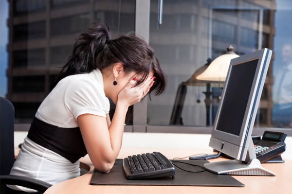 Stressed woman at work