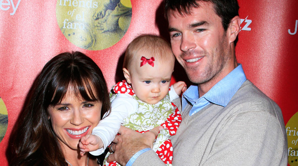 Trista and Ryan Sutter pose with baby Blakesley