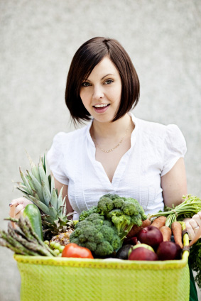 Woman picking up CSA produce