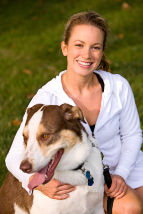 Woman running with dog