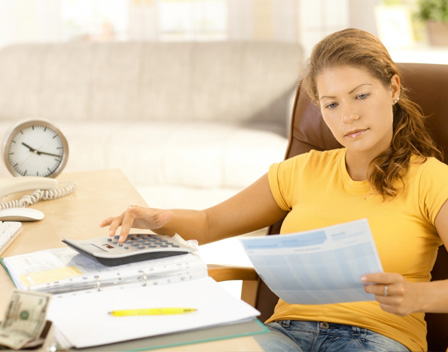 Woman working on home finances
