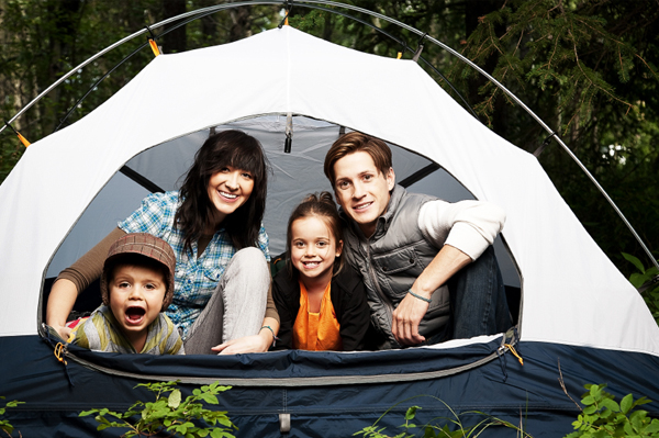 young family out camping