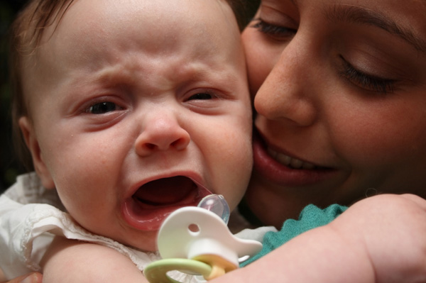 Image result for crying baby with mom
