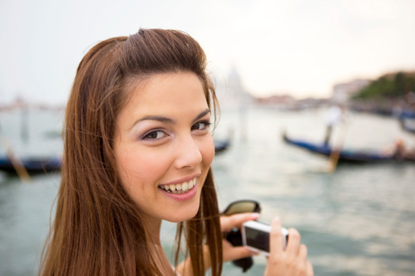 young woman taking pictures