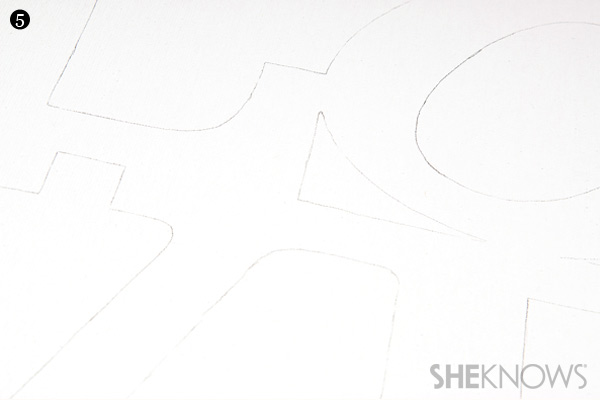 DIY craft project step 5: LOVE letters traced on canvas
