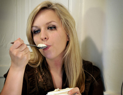 Sad woman eating ice cream