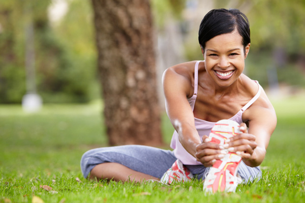 Woman in her 40s stretching