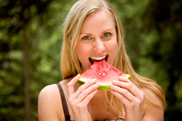 Woman eating watermelon