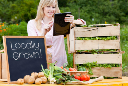 Woman farmer with tablet