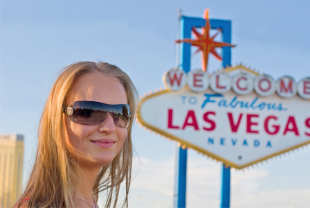 Woman in front of Las Vegas sign