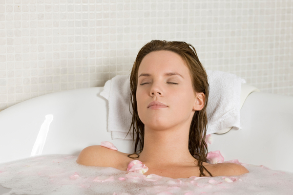 Woman relaxing in tub