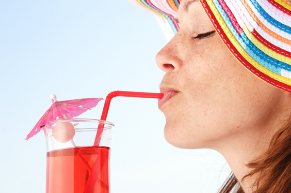 woman-sipping-on-cocktail.jpg