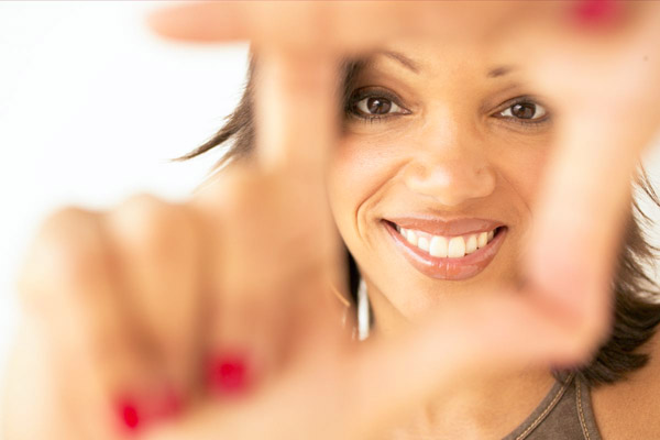 woman setting up shot for photo