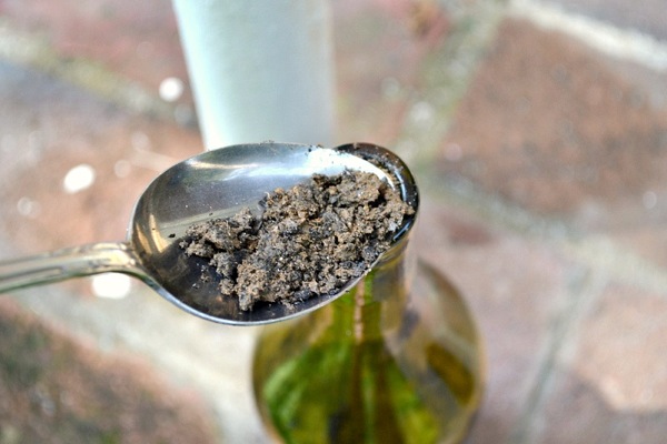 fill bottle with dirt