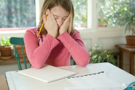 Girl frustrated with math homework