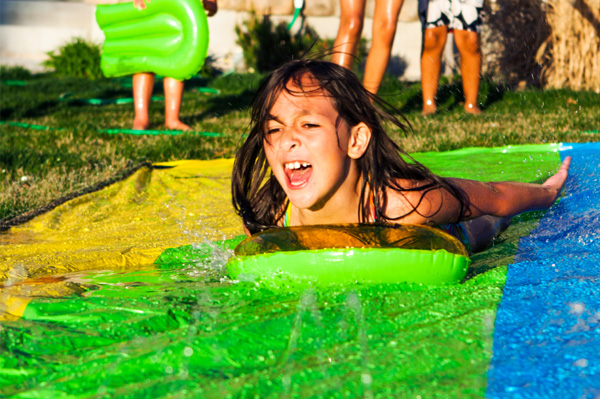 Girl on slip n slide