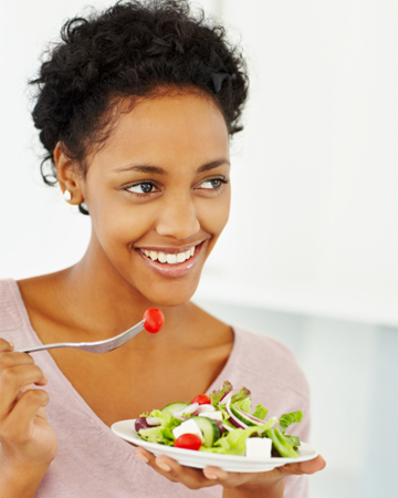http://cdn.sheknows.com/articles/2012/06/happy-woman-eating-summer-salad.jpg