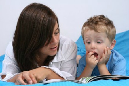 Mom reading with her son