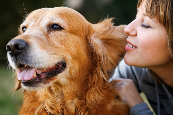 woman loving her dog