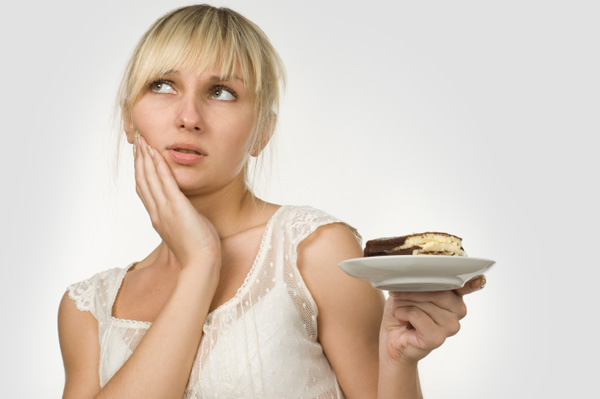Woman eating cake