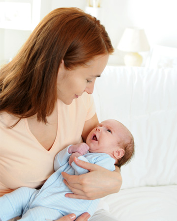 Woman holding newborn