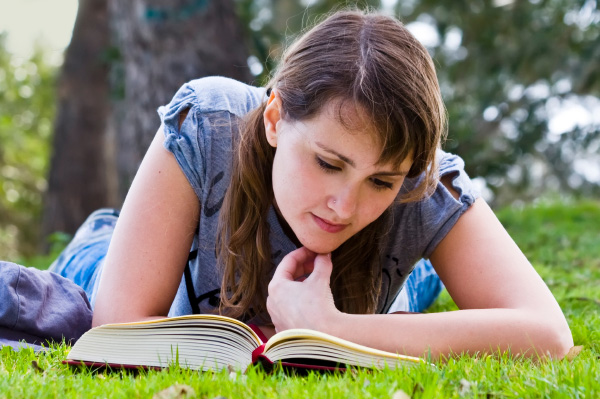 Woman reading outdoors