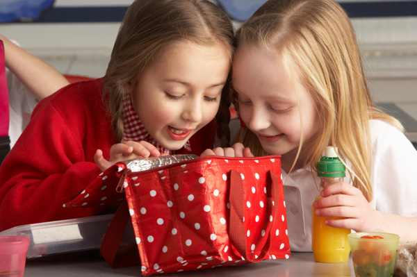 Girls with packed lunch