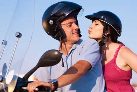 Happy couple on motorcycle