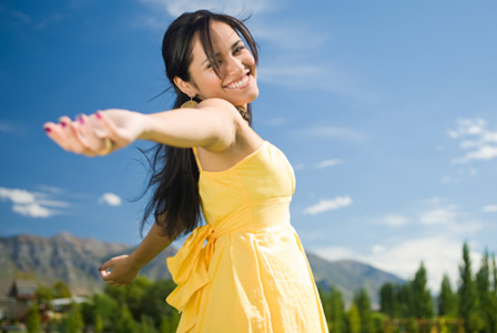 Happy woman in a summer dress