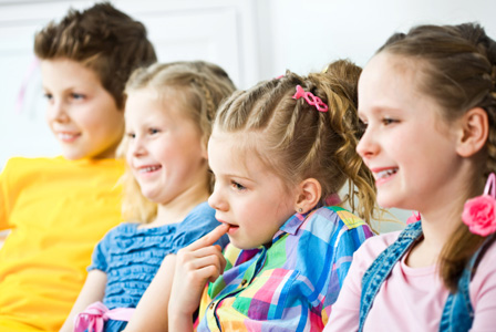 Kids watching a movie