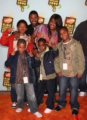 Usher mourns at stepson Kile Glover's funeral Friday.
