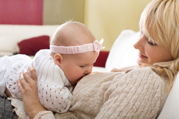 Woman breastfeeding baby